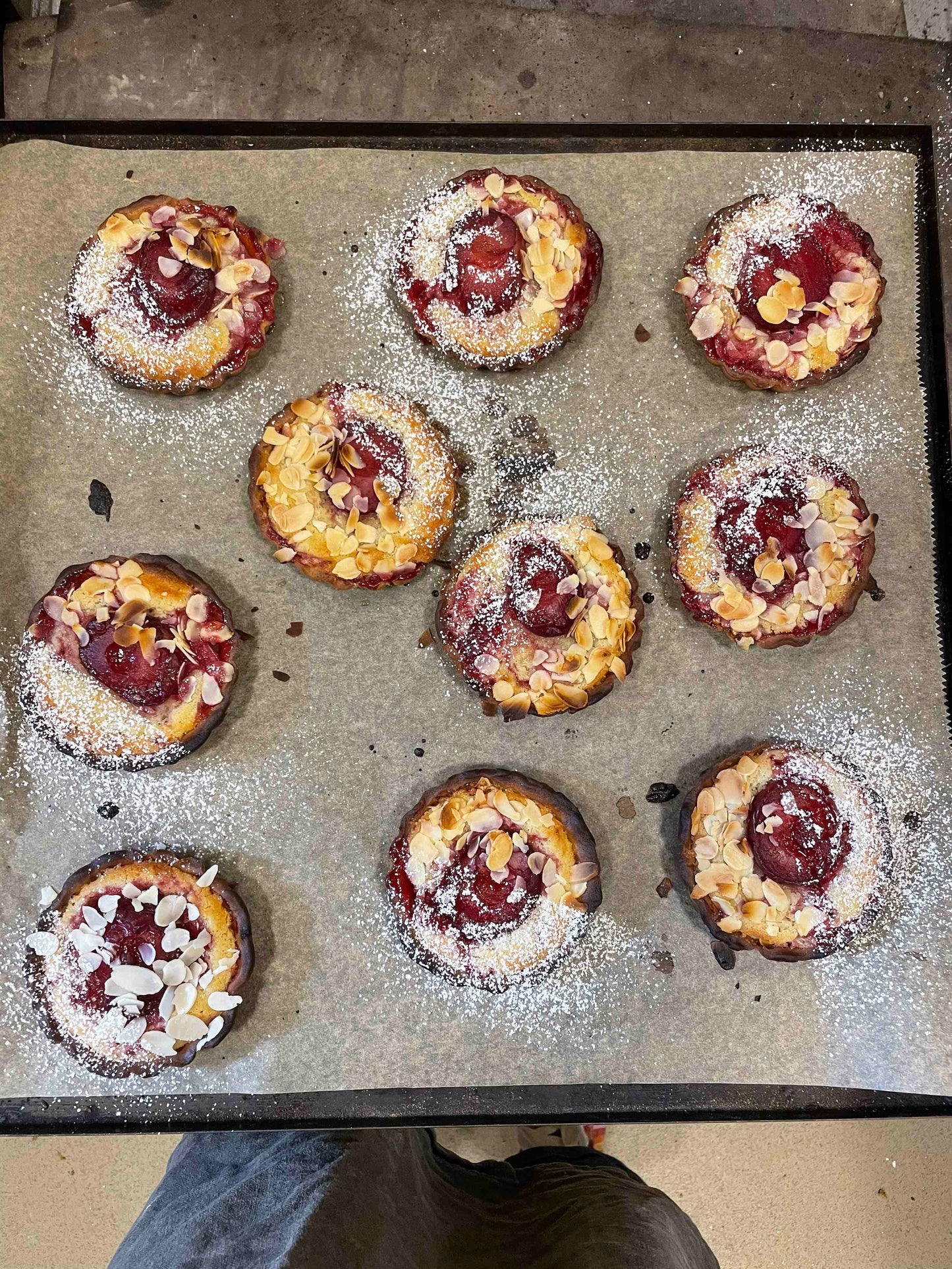 Roast plum, bay & frangipane tart