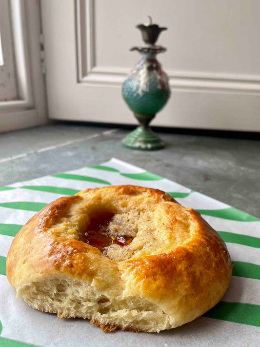 Marmalade, custard & almond brittle brioche bun